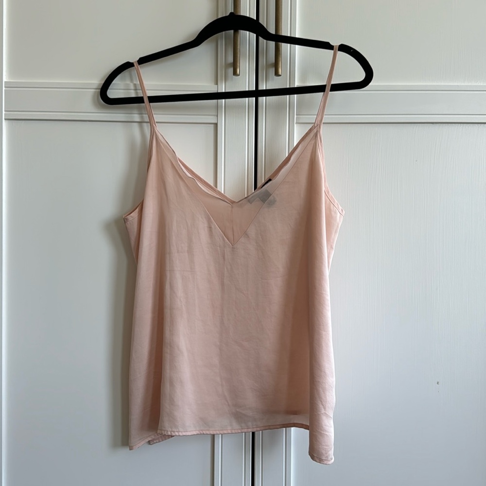 Silky peach flowy blouse perfect for summer
